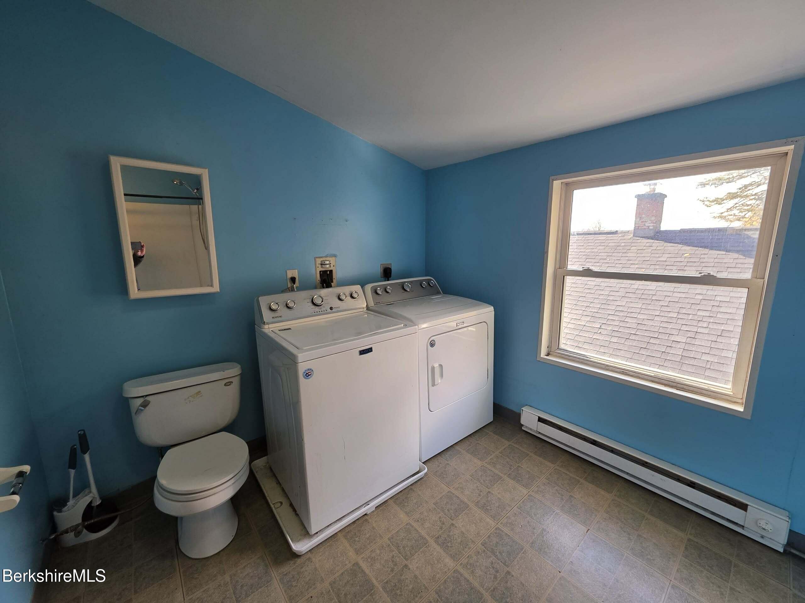 57 Beacon Street, Unit 3 North Adams, MA 01247 - Photo 10 of 10 a bathroom with a toilet sink and mirror