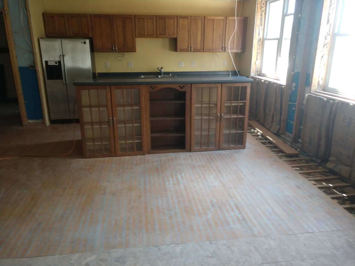 350 County Line Road Lee, IL 60530 - Photo 4 of 31 a kitchen with wooden cabinets and a refrigerator