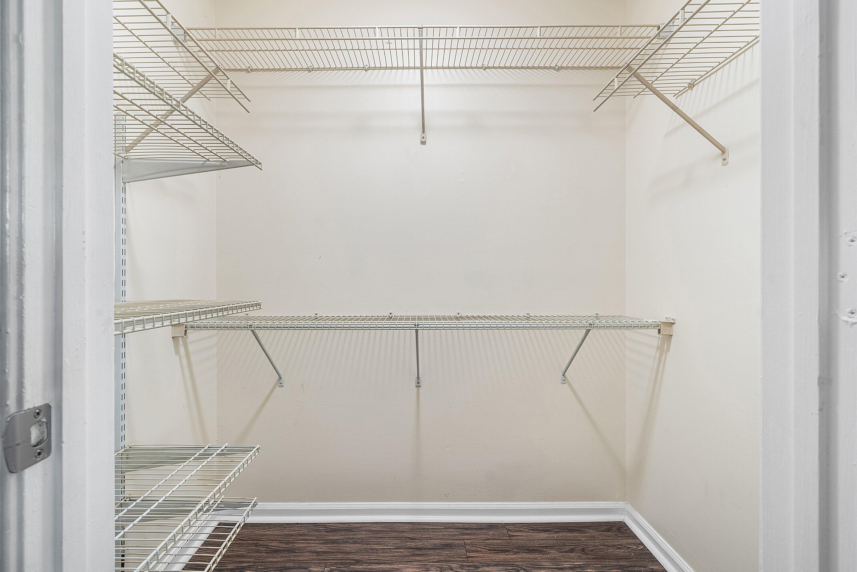 1001 Crystal Way, Unit M Delray Beach, FL 33444 - Photo 19 of 42 a view of a room with racks on the wall