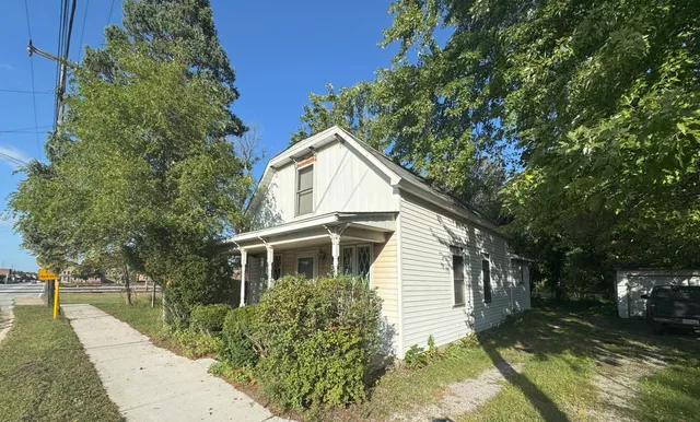 a view of house with outdoor space