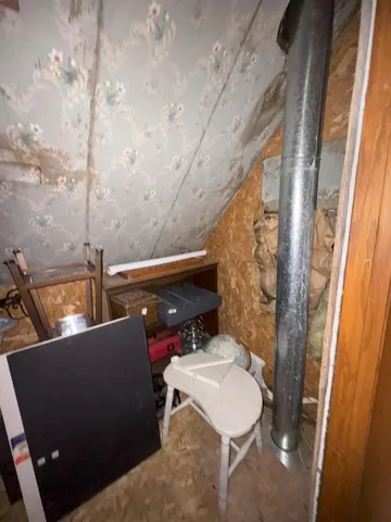 a view of a refrigerator in a kitchen