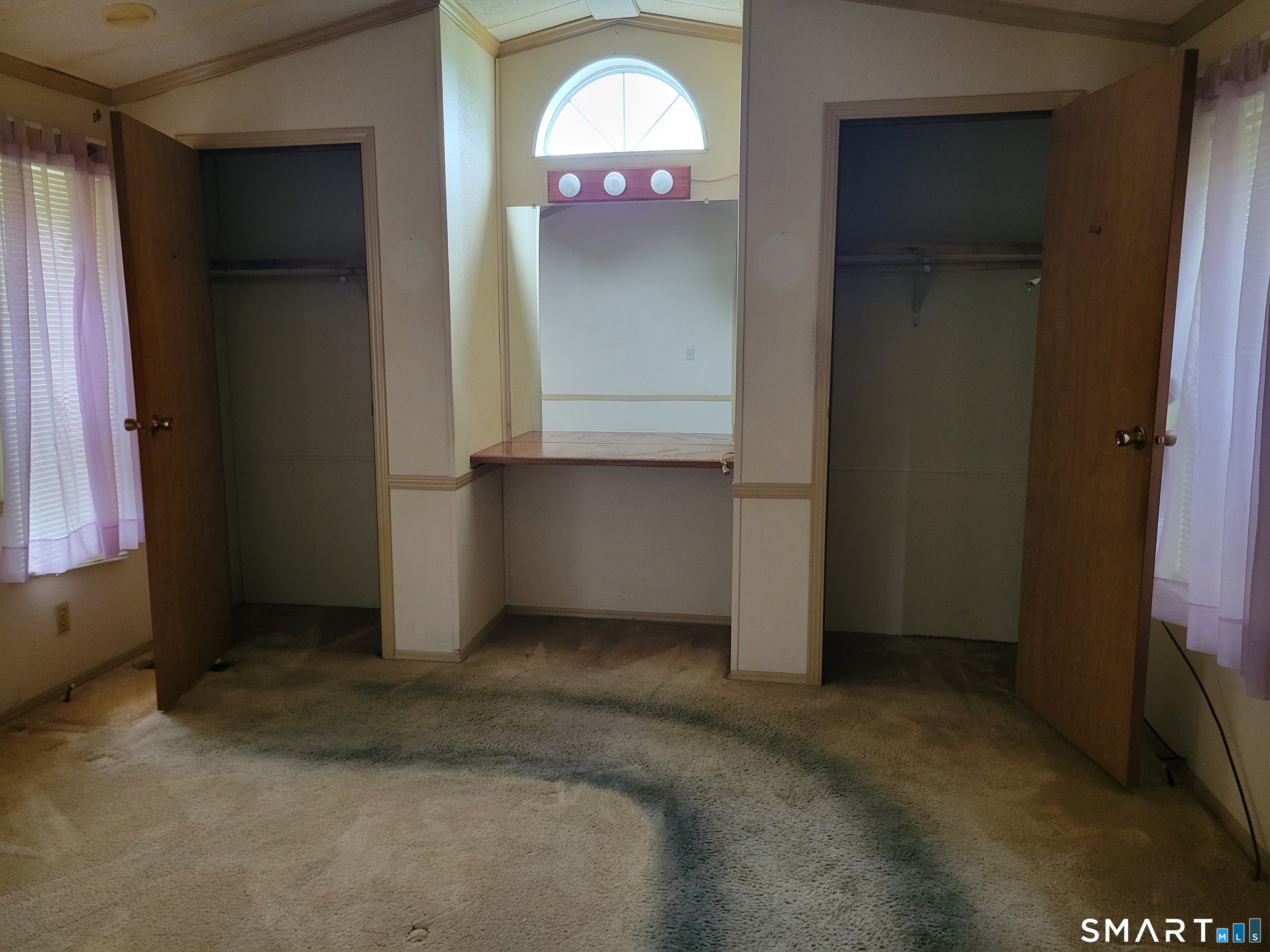 134 E Street Groton, CT 06340 - Photo 4 of 5 an empty room with windows