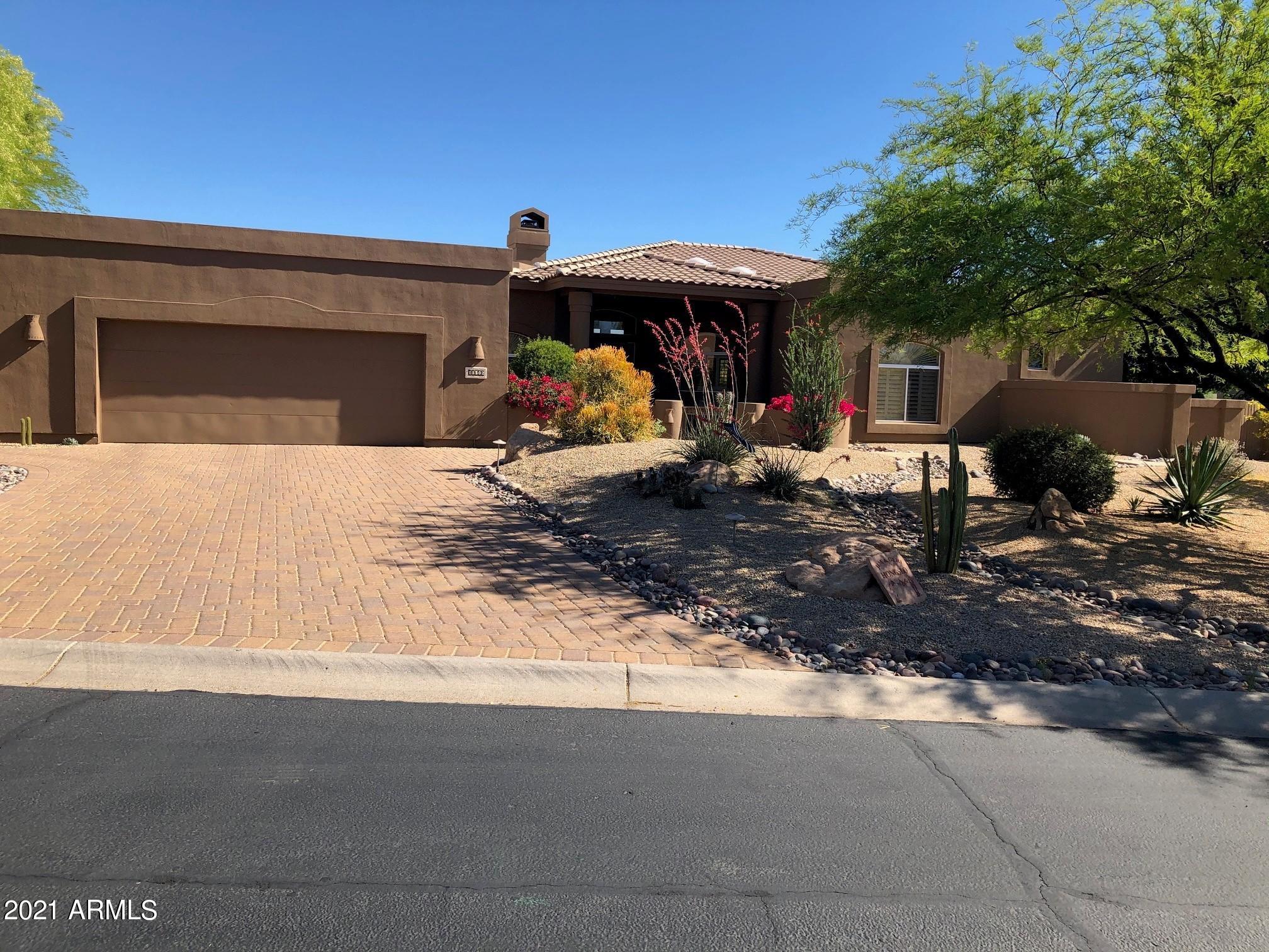 18502 East Picacho Road Rio Verde, AZ 85263 - Photo 1 of 15 a view of a outdoor space with porch and furniture