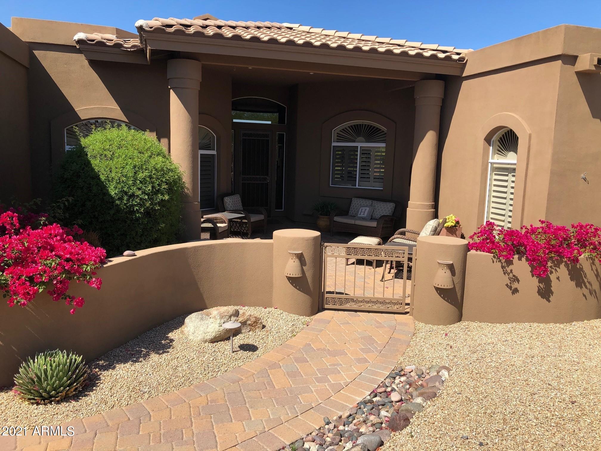 18502 East Picacho Road Rio Verde, AZ 85263 - Photo 2 of 15 a front view of a house