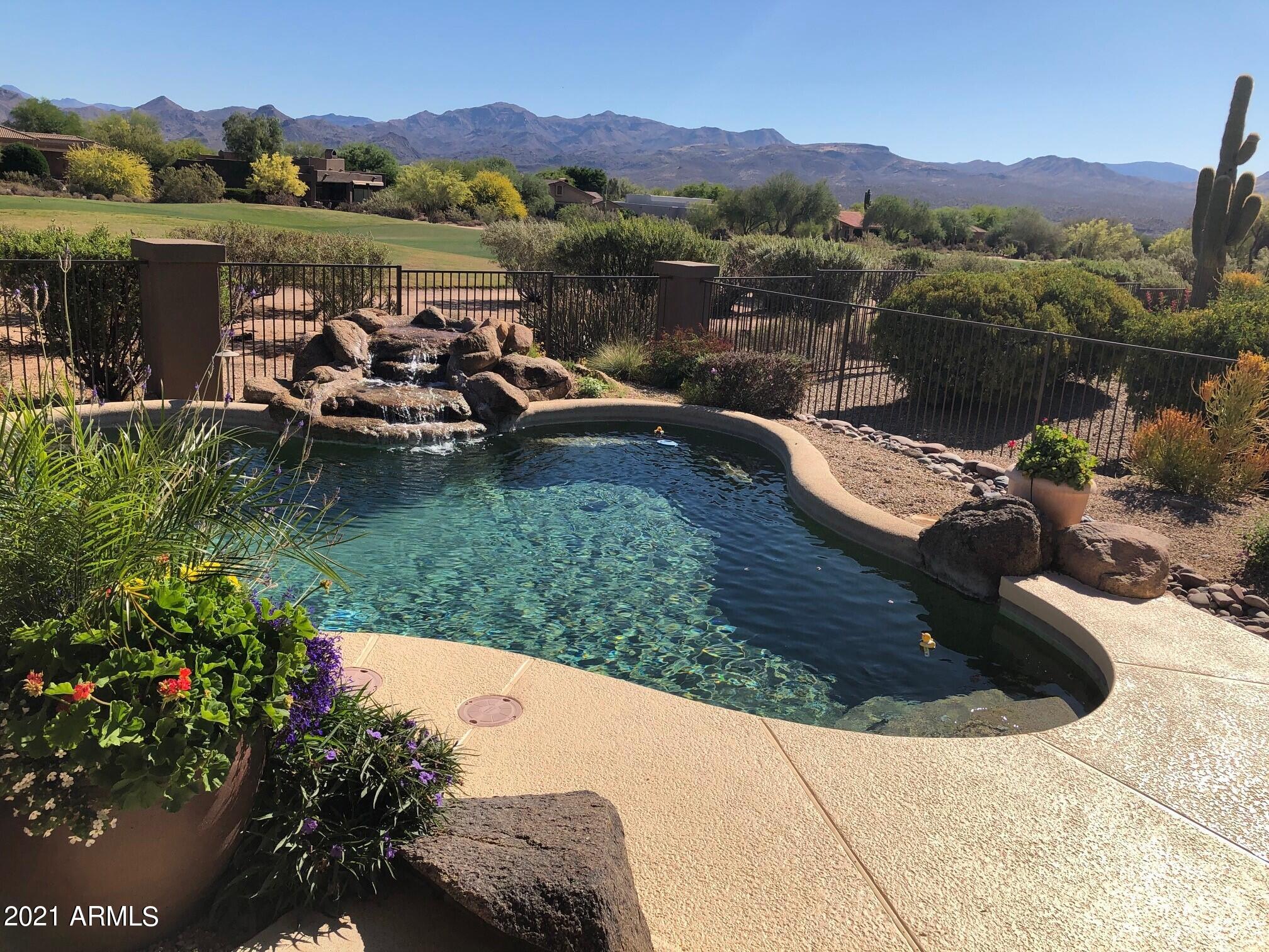 18502 East Picacho Road Rio Verde, AZ 85263 - Photo 5 of 15 a view of a lake with a mountain