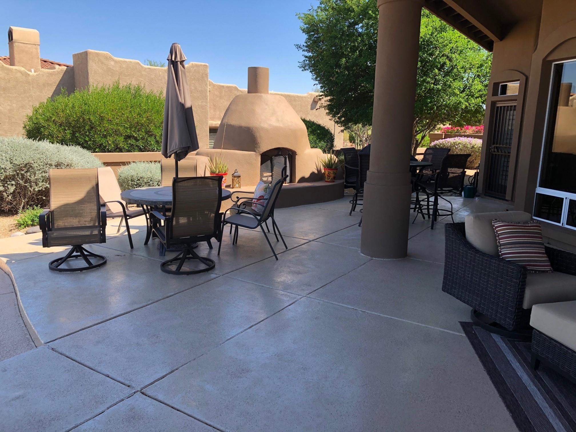 18502 East Picacho Road Rio Verde, AZ 85263 - Photo 6 of 15 a view of a patio with table and chairs and potted plants
