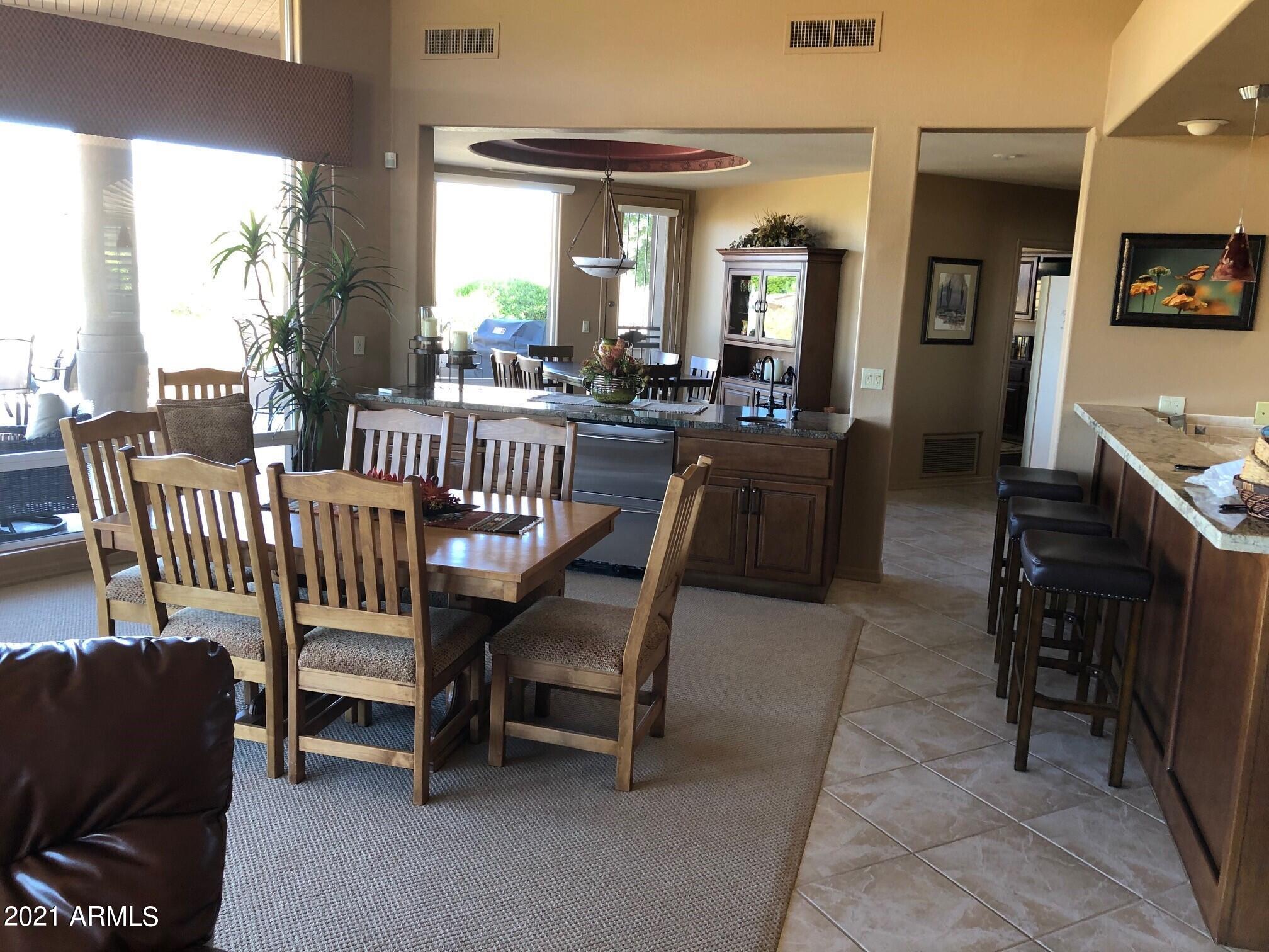 18502 East Picacho Road Rio Verde, AZ 85263 - Photo 8 of 15 a view of a livingroom with furniture and windows