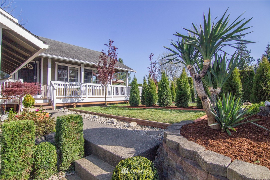 2311 Cedar Road Lake Stevens, WA 98258 - Photo 2 of 37 a front view of a house with garden