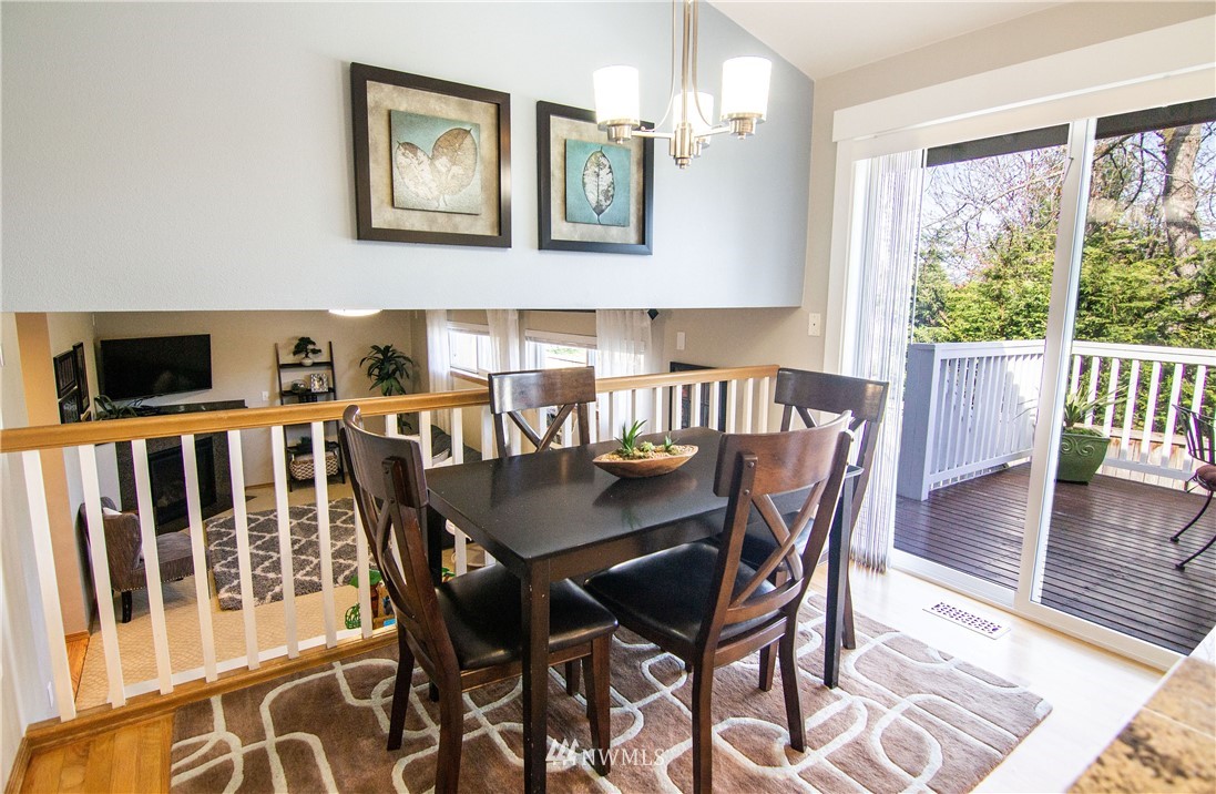2311 Cedar Road Lake Stevens, WA 98258 - Photo 11 of 37 a view of a dining room with furniture and wooden floor