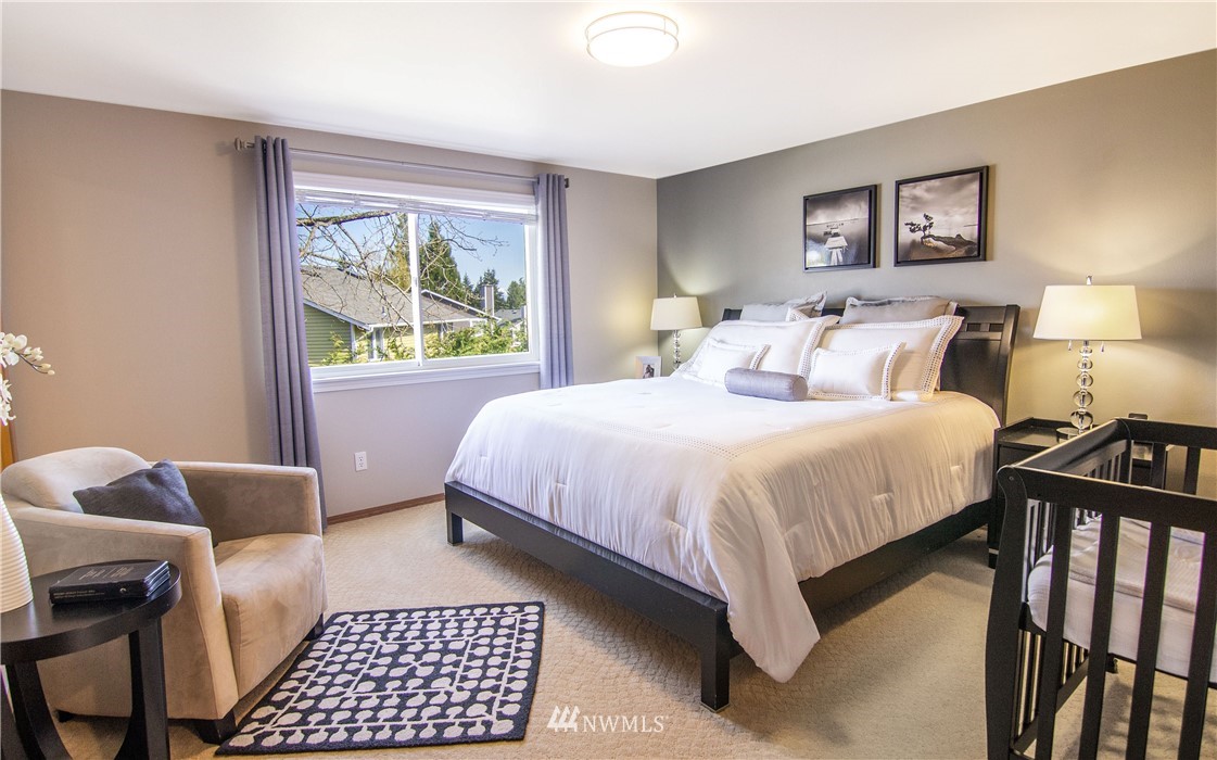 2311 Cedar Road Lake Stevens, WA 98258 - Photo 21 of 37 a bedroom with a bed couch and a window