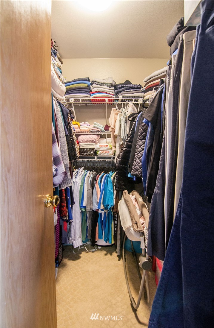 2311 Cedar Road Lake Stevens, WA 98258 - Photo 23 of 37 a view of walk in closet with clothes and shoes