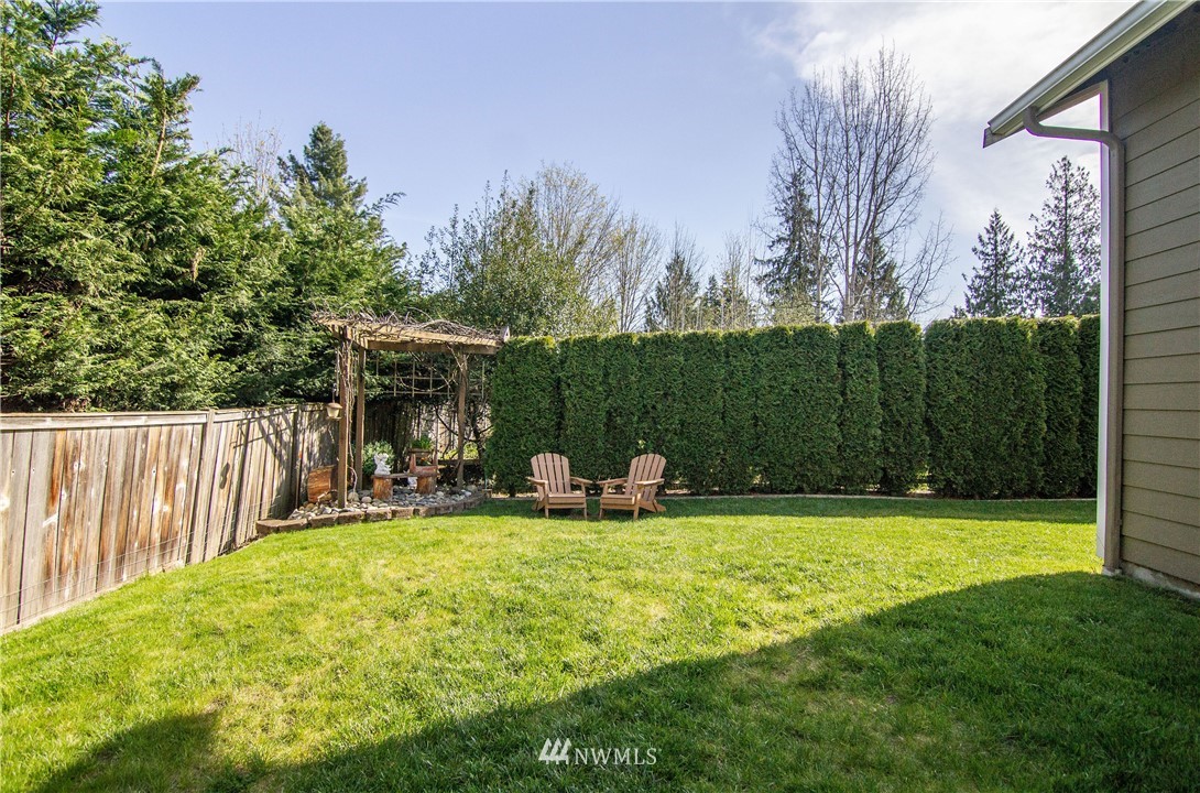 2311 Cedar Road Lake Stevens, WA 98258 - Photo 30 of 37 a view of backyard with swimming pool and green space