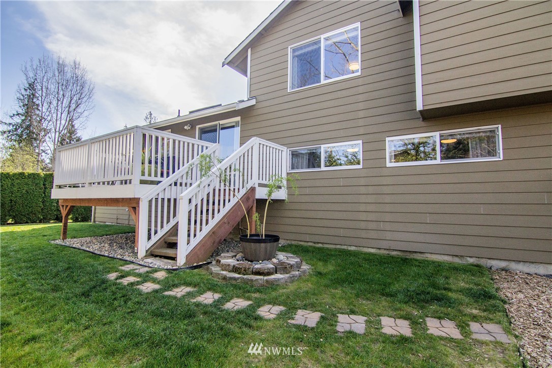 2311 Cedar Road Lake Stevens, WA 98258 - Photo 32 of 37 a view of a house with a yard and deck