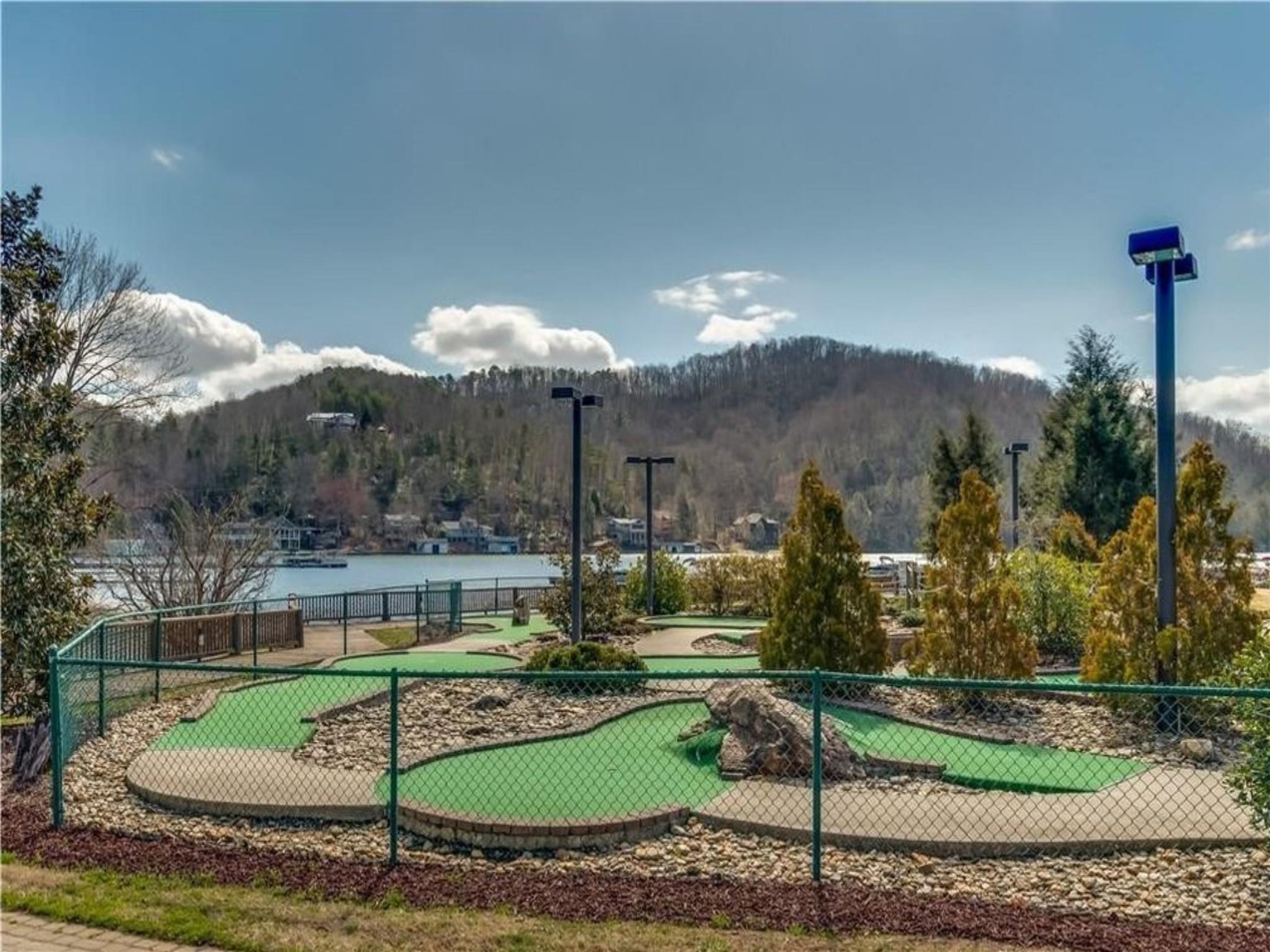 Lot 211 Quail Ridge Rd Lake Lake Lure, NC 28746 - Photo 23 of 25 a view of a water fountain in front of the house