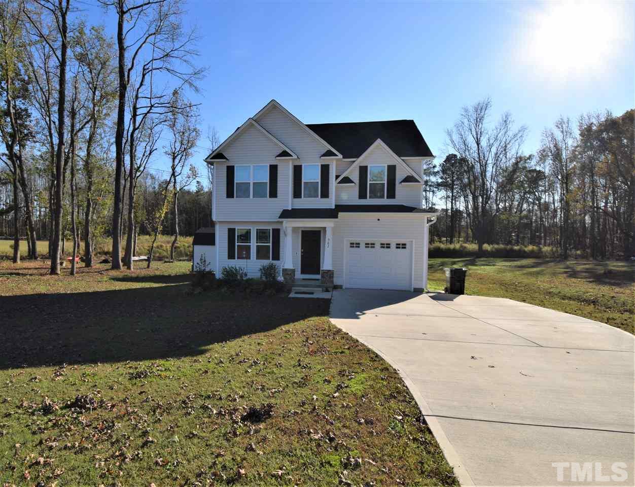 582 Roberts Road Willow Spring, NC 27592 - Photo 2 of 17 a front view of a house with a yard