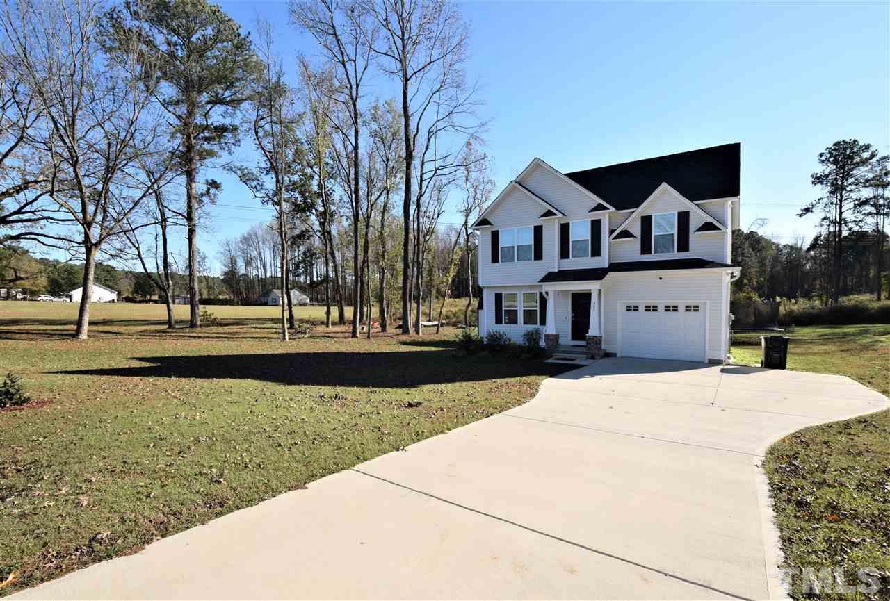582 Roberts Road Willow Spring, NC 27592 - Photo 3 of 17 a front view of building with yard