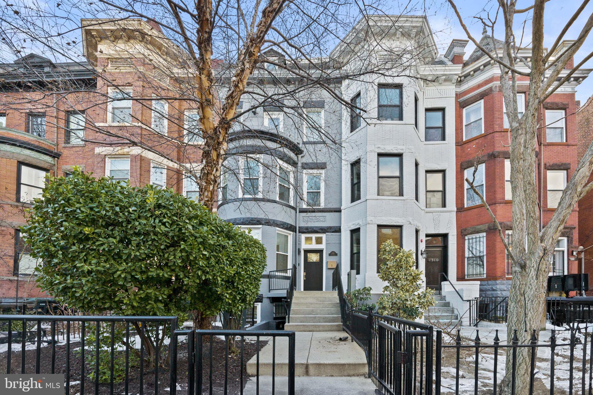 a front view of a multi story residential apartment buildings