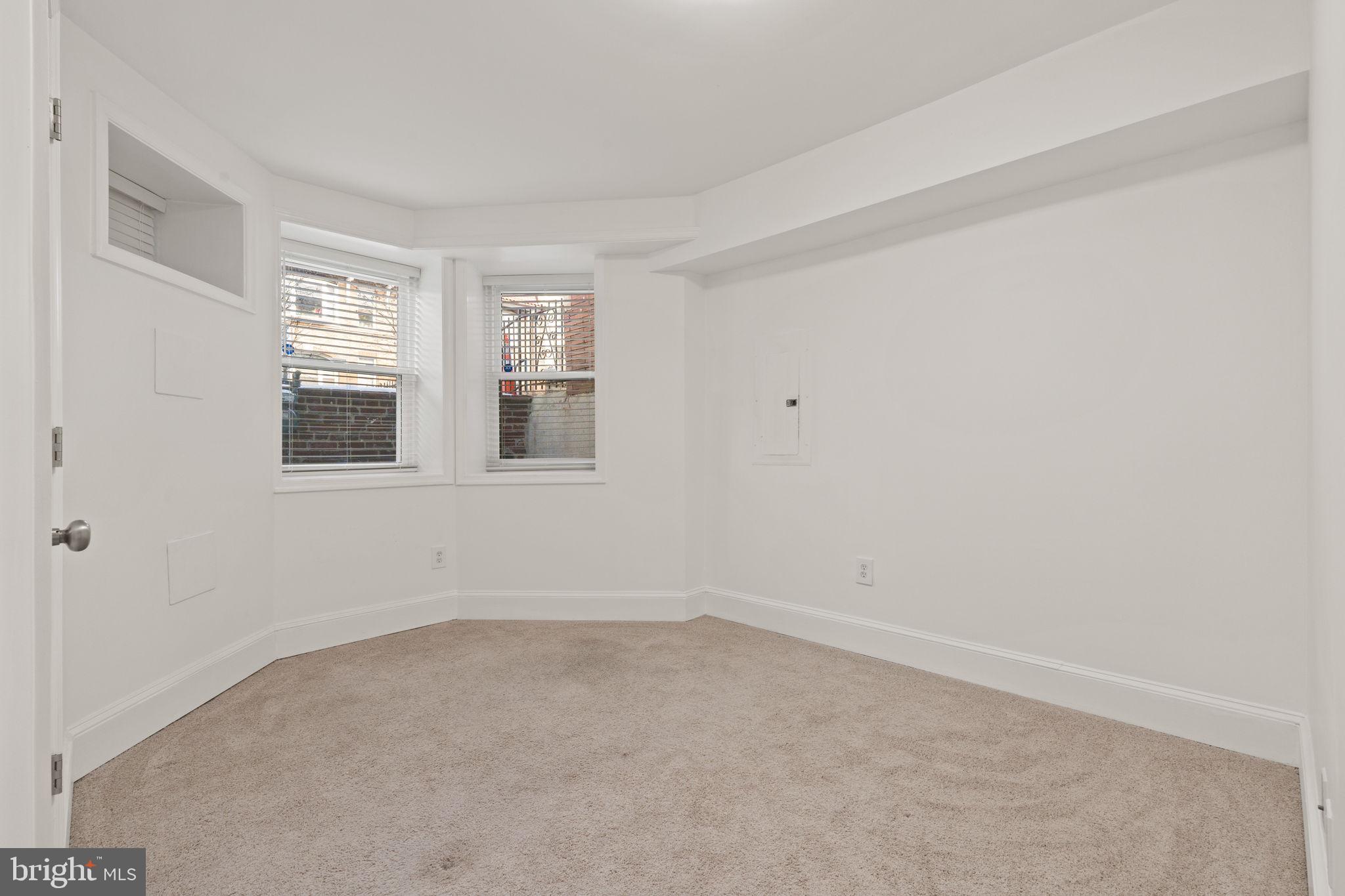 1308 Park Road Northwest, Unit 2 Washington, DC 20010 - Photo 12 of 17 an empty room with windows