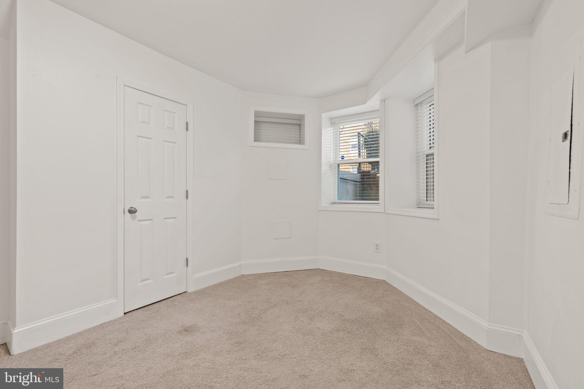1308 Park Road Northwest, Unit 2 Washington, DC 20010 - Photo 13 of 17 an empty room with windows
