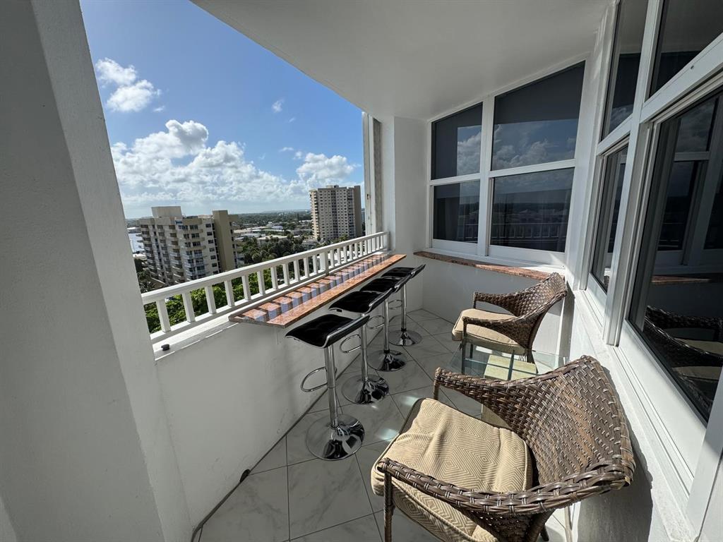 1340 South Ocean Boulevard, Unit 1109 Pompano Beach, FL 33062 - Photo 16 of 42 a living room with furniture