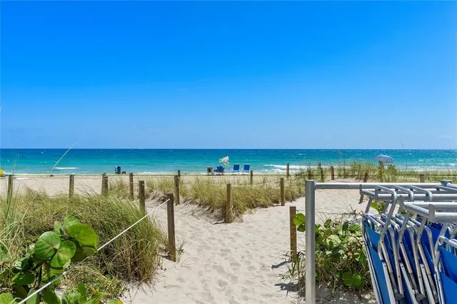 a view of a balcony with an ocean view