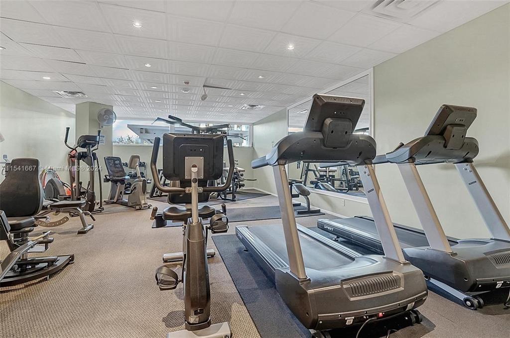 1340 South Ocean Boulevard, Unit 1109 Pompano Beach, FL 33062 - Photo 29 of 42 a view of a room with gym equipment