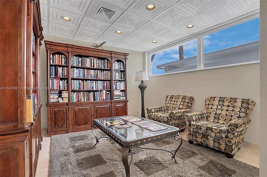 1340 South Ocean Boulevard, Unit 1109 Pompano Beach, FL 33062 - Photo 33 of 42 a view of a livingroom with furniture and window