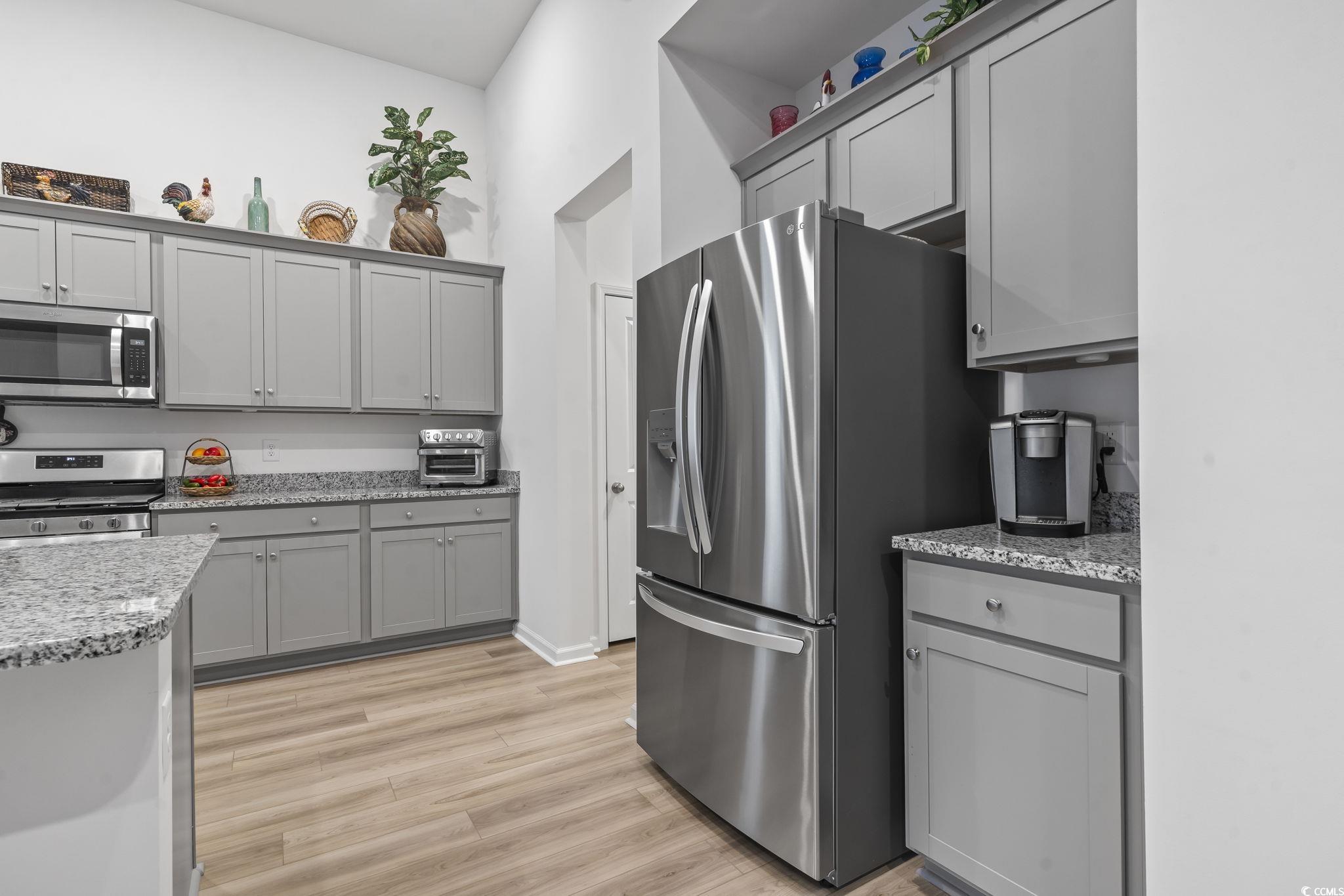 394 Sun Colony Boulevard Longs, SC 29568 - Photo 12 of 40 Sparkling new refrigerator that conveys with the home