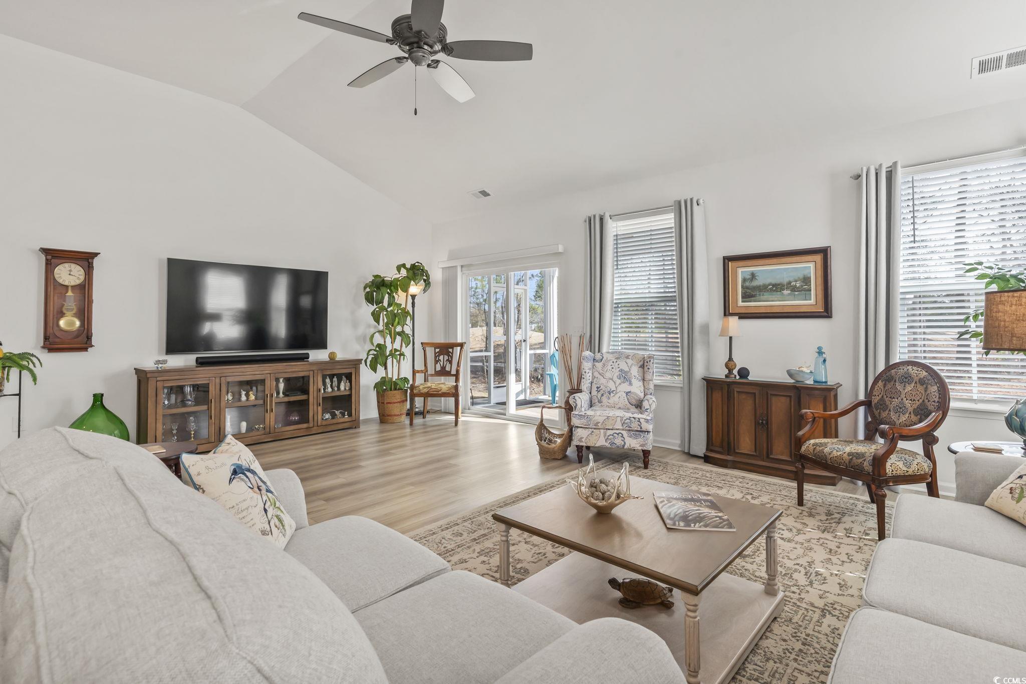 394 Sun Colony Boulevard Longs, SC 29568 - Photo 2 of 37 Enjoy the open living area with views of the 14th hole