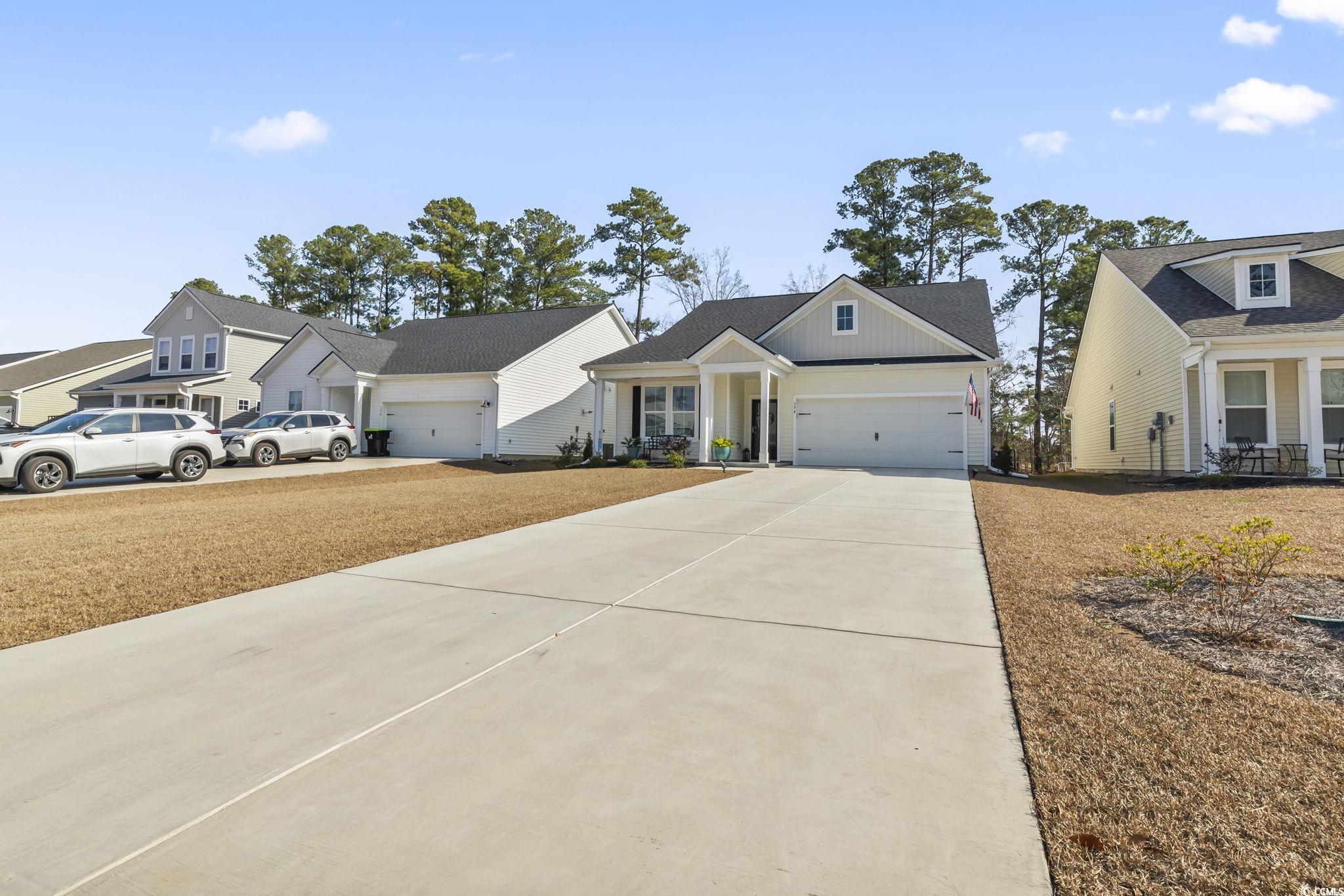 394 Sun Colony Boulevard Longs, SC 29568 - Photo 37 of 37 Large 2 car garage with plenty of parking