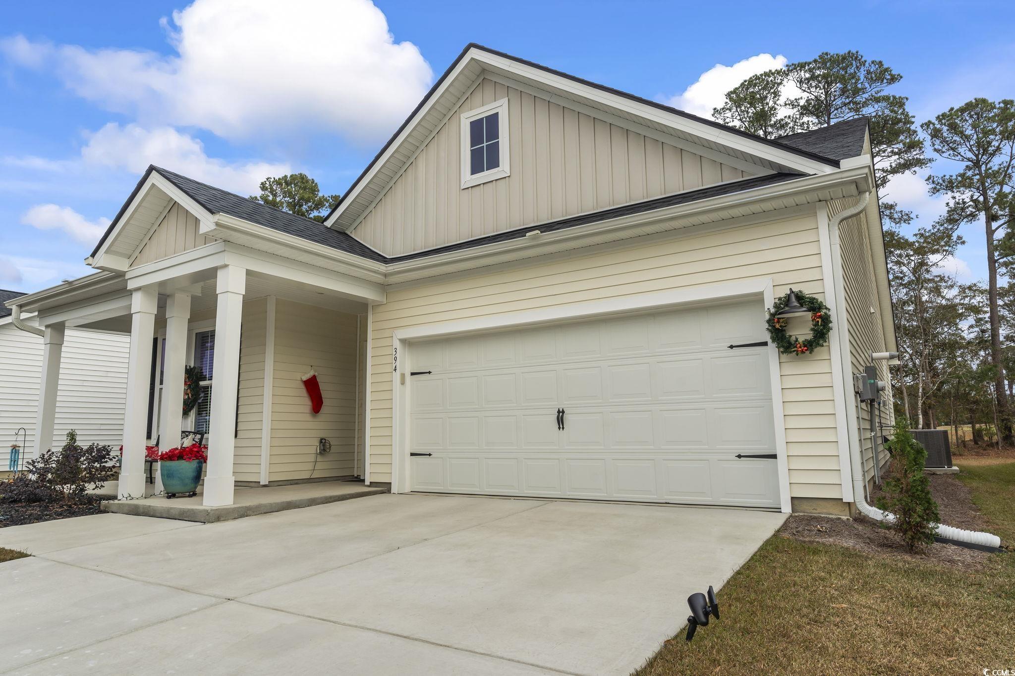 394 Sun Colony Boulevard Longs, SC 29568 - Photo 38 of 40 Large 2 car garage with plenty of parking