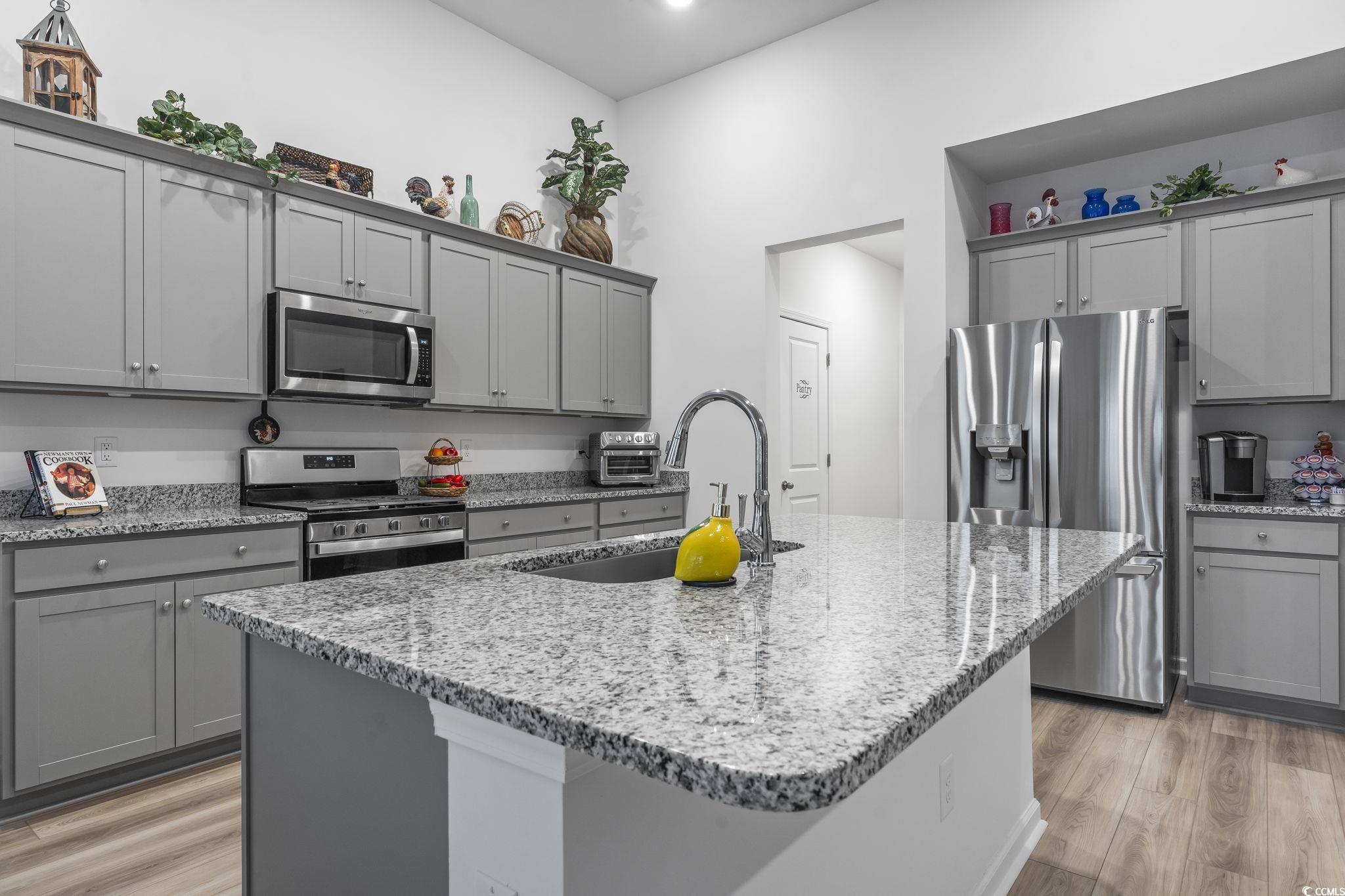 394 Sun Colony Boulevard Longs, SC 29568 - Photo 10 of 40 Large work island and breakfast bar area for those family gatherings
