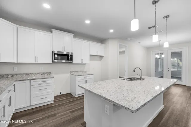 a room with furniture and a book shelf