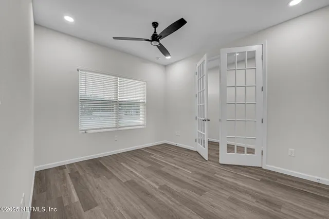 a bathroom with a granite countertop sink mirror and double
