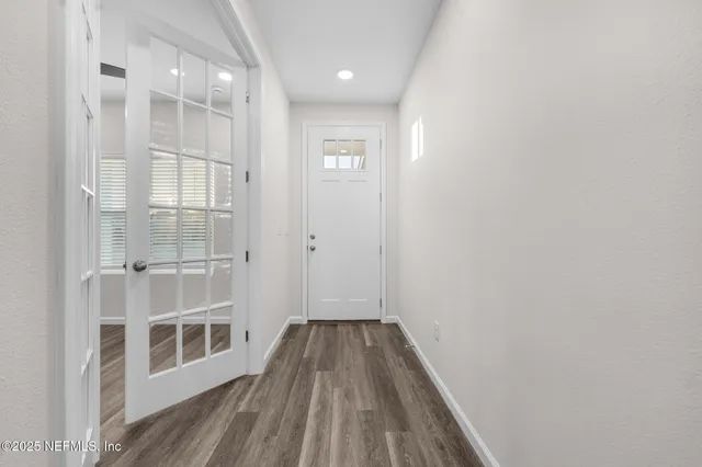 a view of an empty room and window