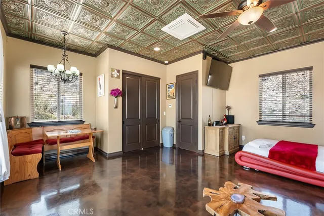 front view of a house with a potted plant