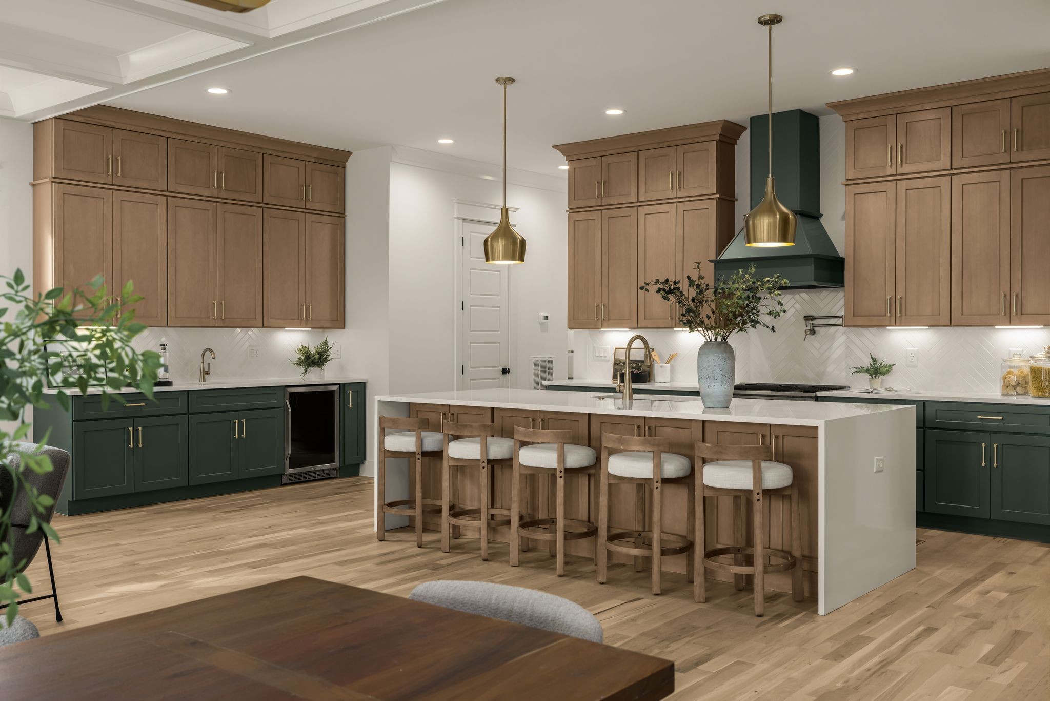 2512 Sheridan Road Nashville, TN 37206 - Photo 16 of 45 a kitchen with stainless steel appliances kitchen island granite countertop a table chairs sink and cabinets