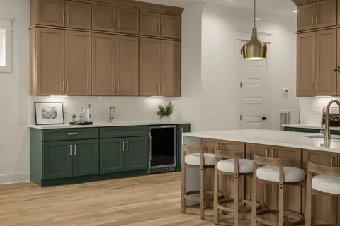 a bathroom with a double vanity sink mirror and shower