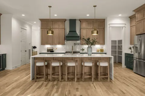 a bathroom with a sink a mirror and vanity