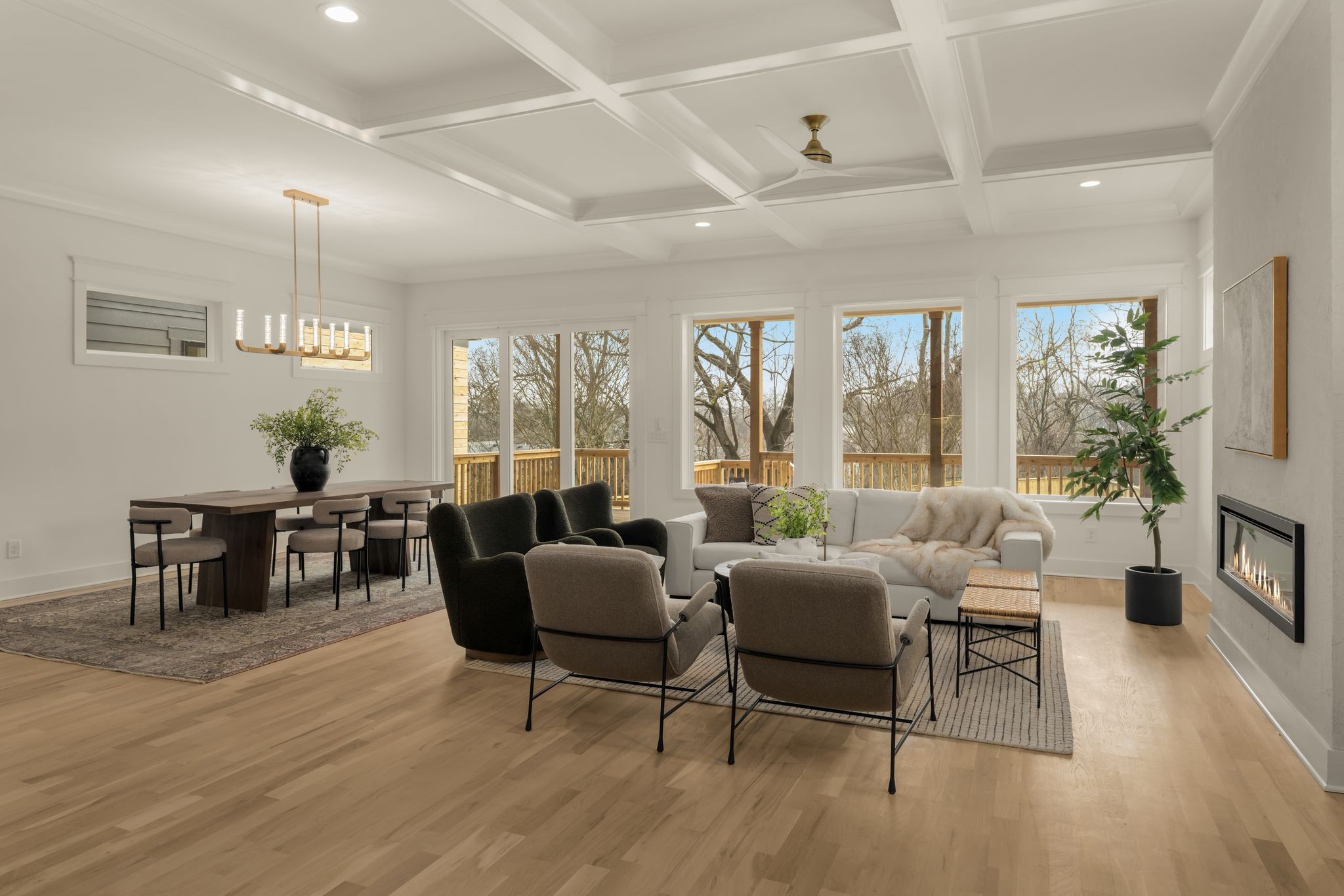 2512 Sheridan Road Nashville, TN 37206 - Photo 7 of 45 a living room with furniture and a dining table with wooden floor