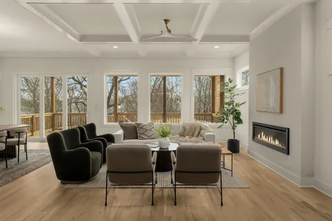 a view of a livingroom with furniture and window