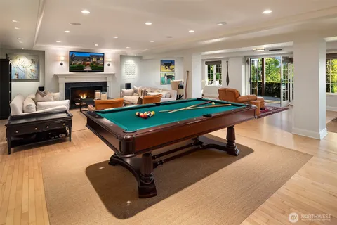 a view of a house with a backyard and sitting area