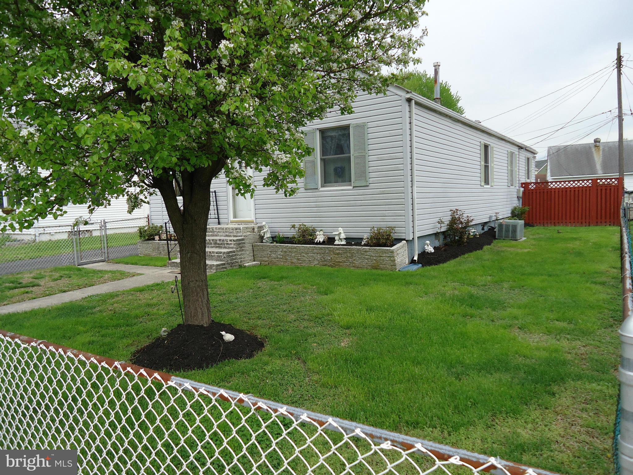 13 German Hill Road Baltimore, MD 21222 - Photo 2 of 15 a backyard of a house with lots of green space