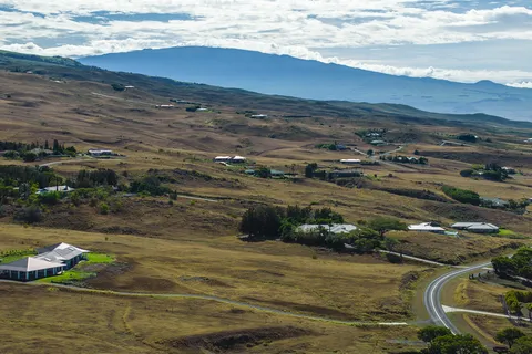 a view of a swimming pool and an ocean view