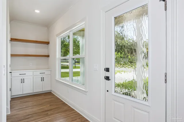 a view of a kitchen with a window and a sink