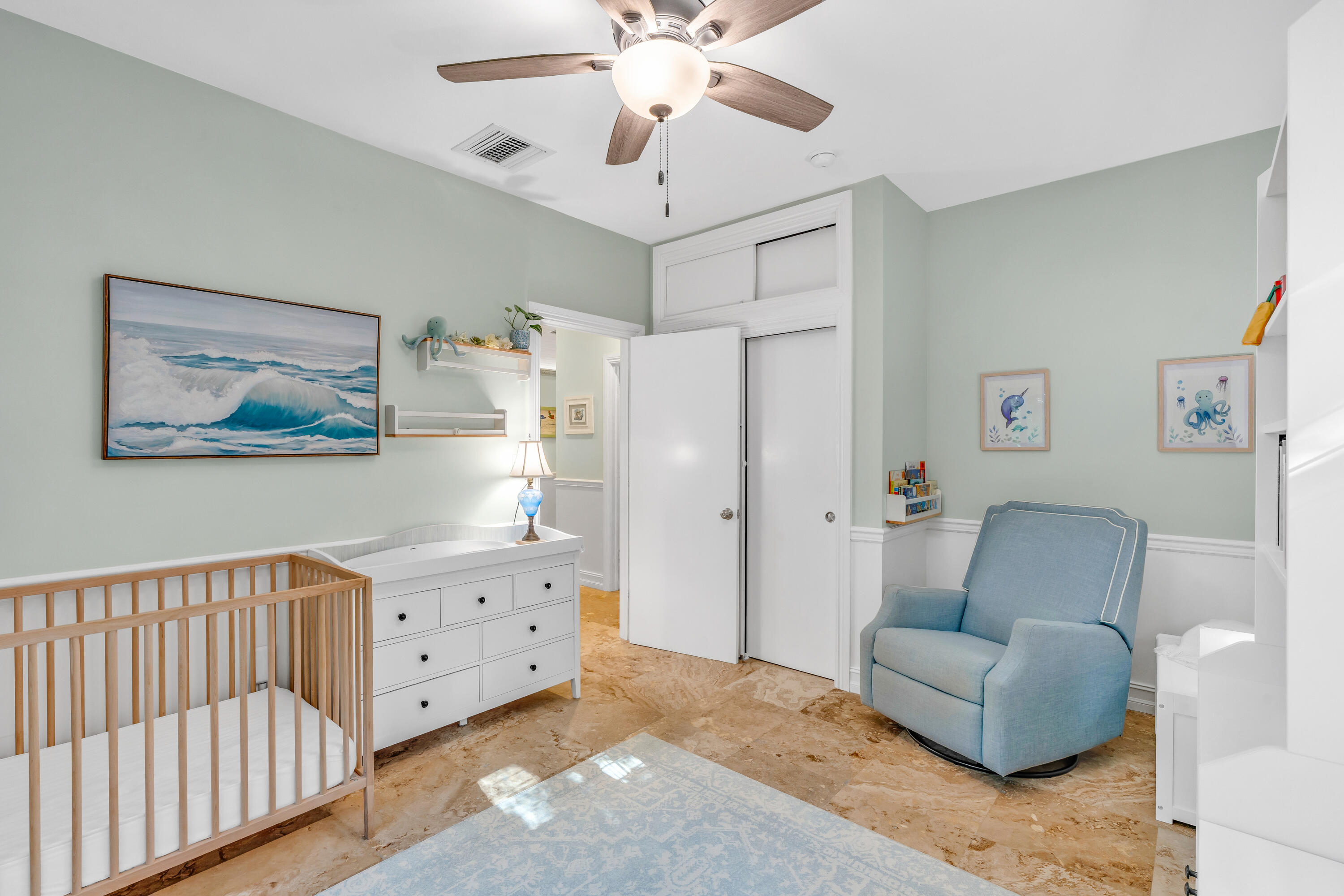 33 Blue Runner Street Key Largo, FL 33037 - Photo 33 of 60 a living room with furniture and a chandelier