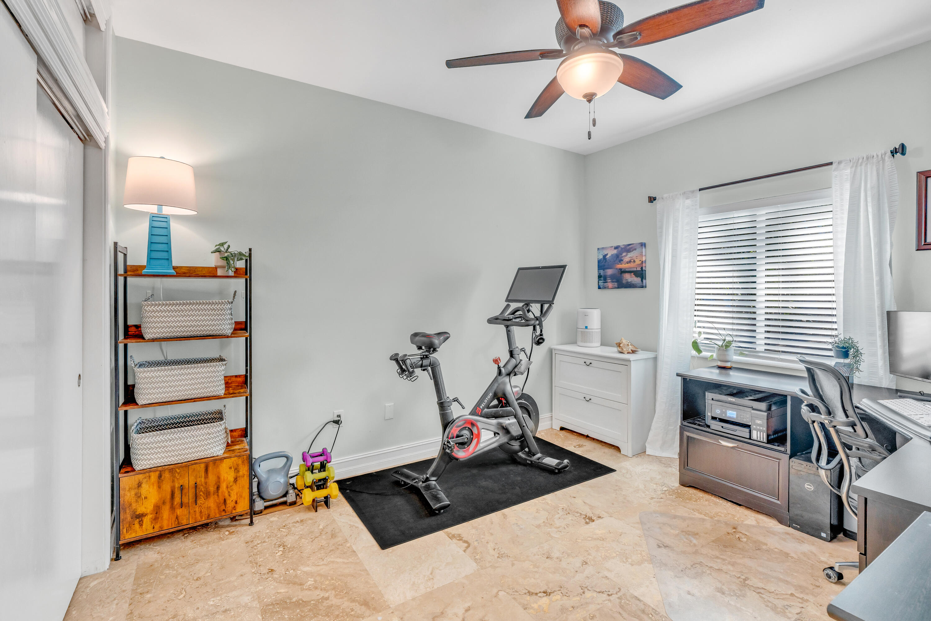 33 Blue Runner Street Key Largo, FL 33037 - Photo 36 of 60 a bedroom with furniture and a chandelier