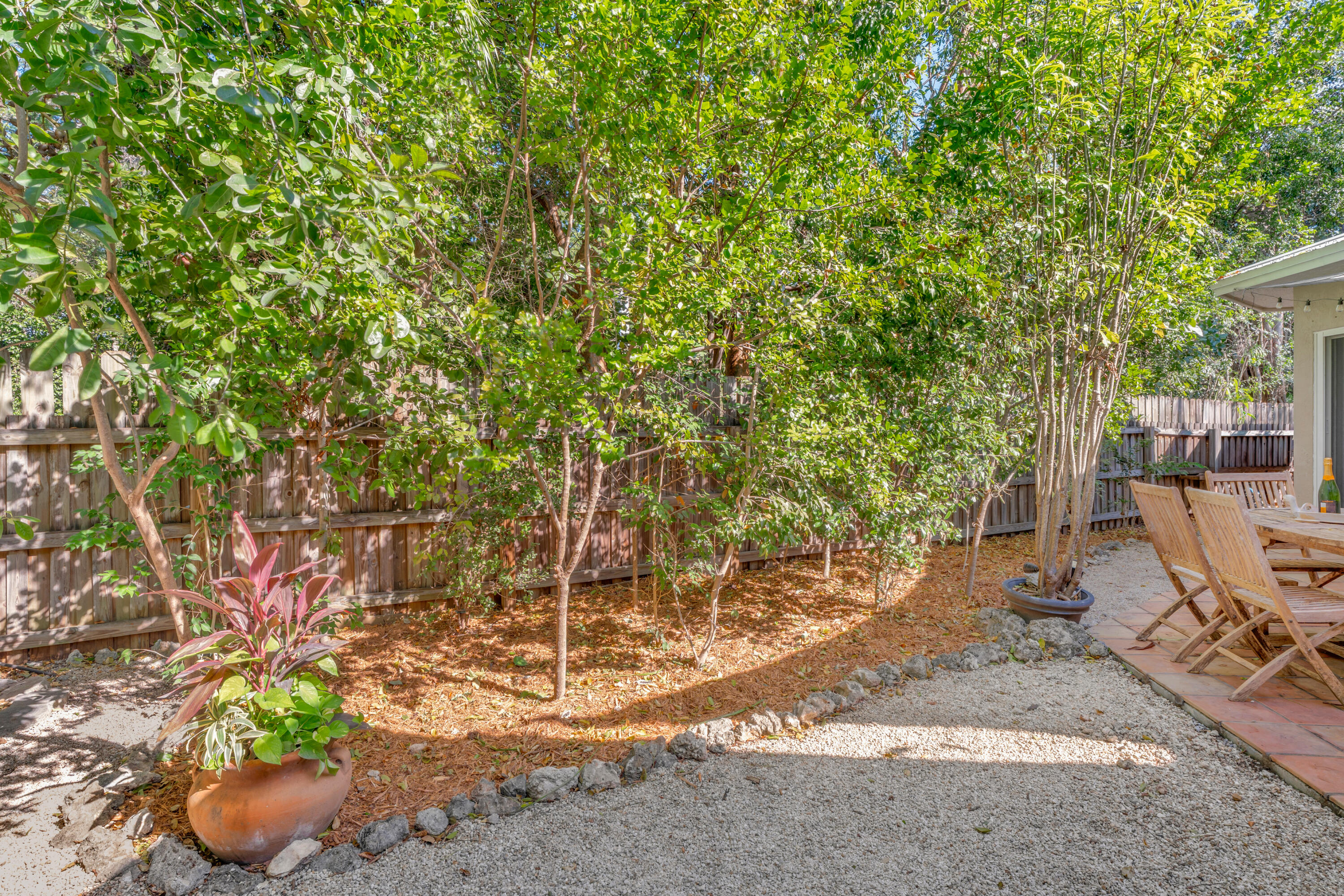 33 Blue Runner Street Key Largo, FL 33037 - Photo 42 of 60 a view of a backyard