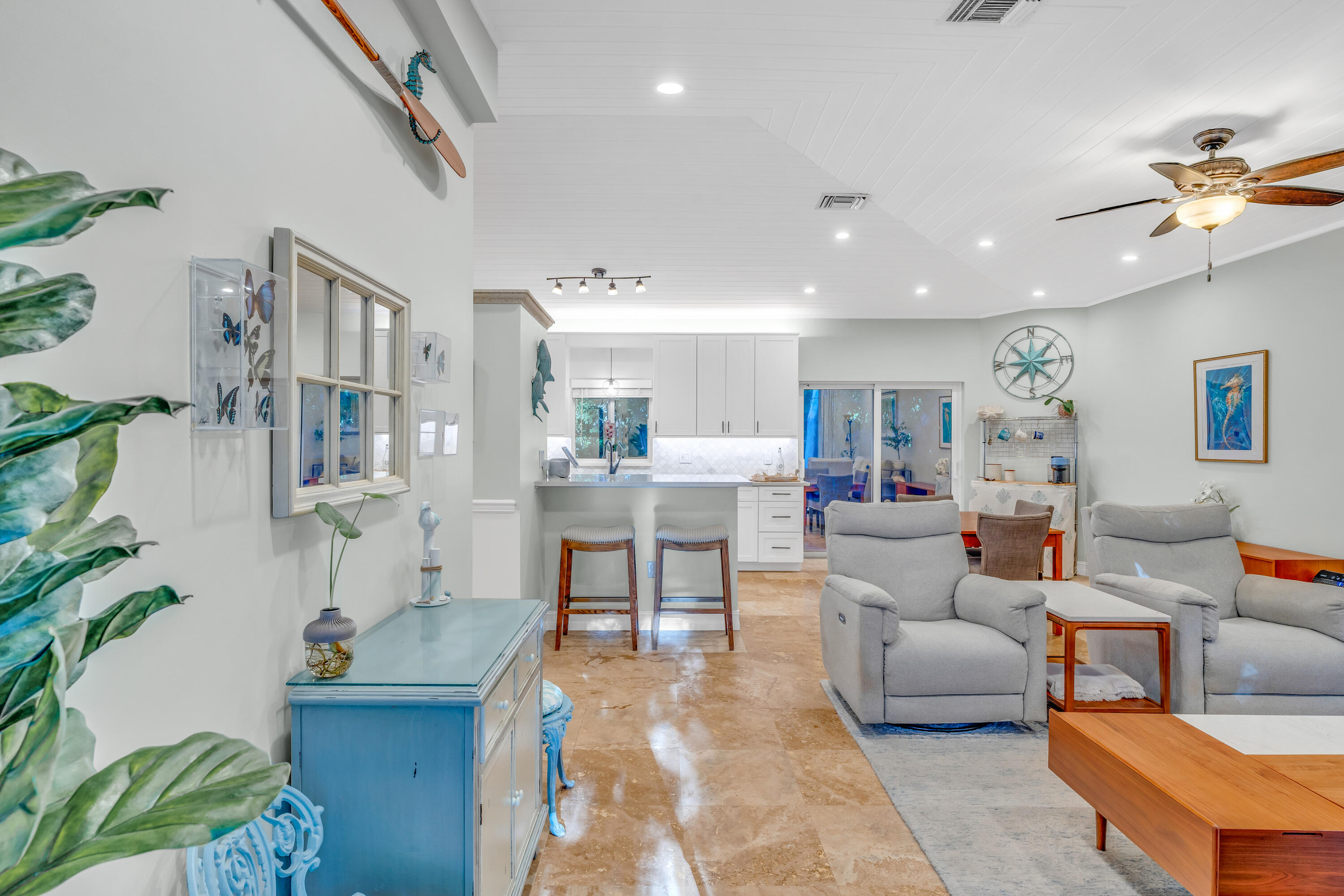 33 Blue Runner Street Key Largo, FL 33037 - Photo 8 of 60 a living room with furniture and a chandelier