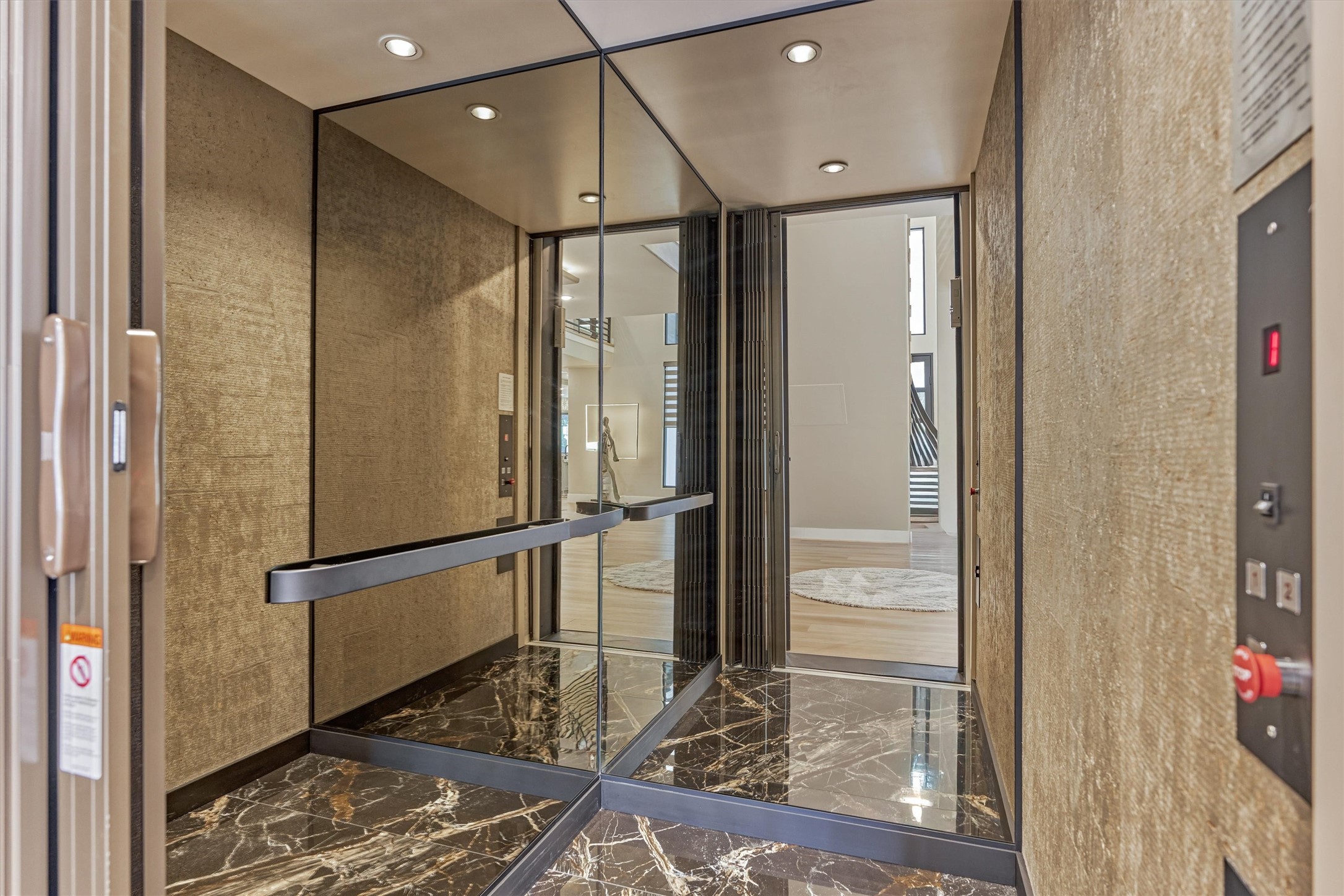 1907 Woerner Road Houston, TX 77090 - Photo 10 of 50 Inside the elegant elevator. This is the largest elevator that can be put in a residential space. Fully automatic!